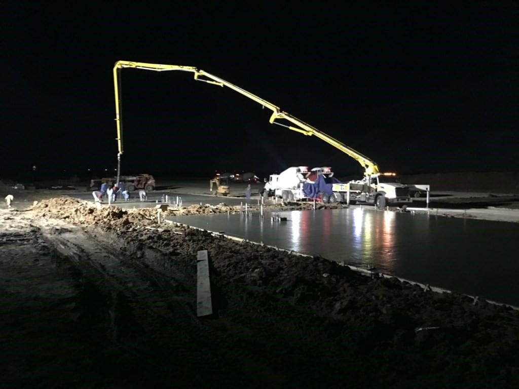 Commercial concrete pouring at night: Commercial Building Contractor in West Texas - RHS Construction Services